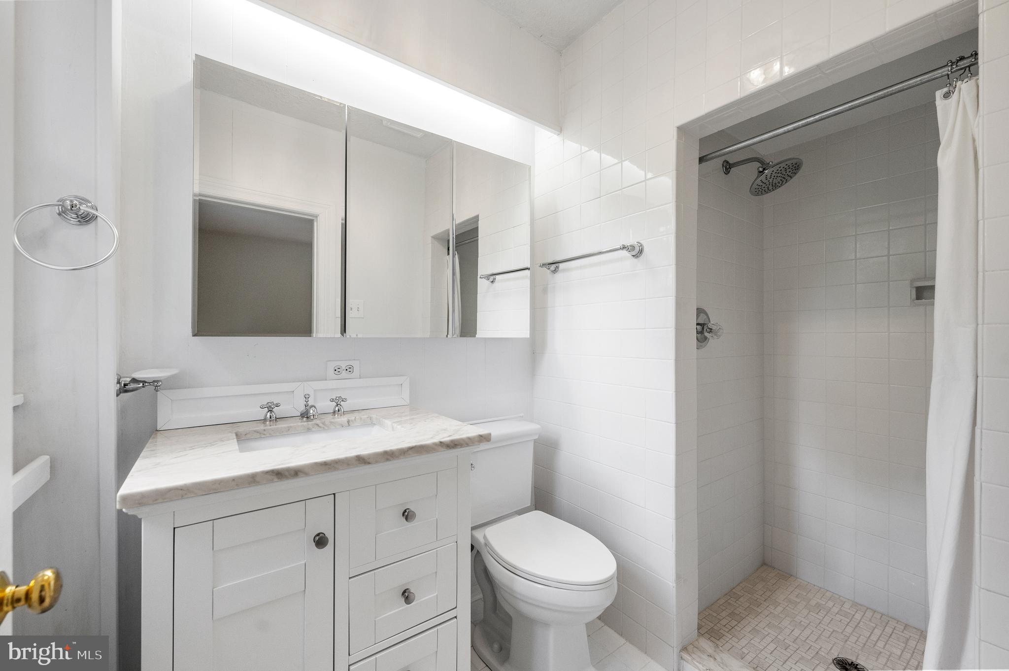 823 King Of Prussia Road Radnor, PA 19087 - Photo 40 of 71 a bathroom with a sink toilet and shower