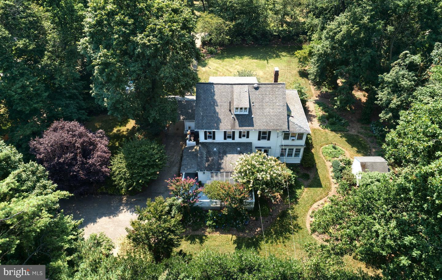 823 King Of Prussia Road Radnor, PA 19087 - Photo 4 of 71 an aerial view of a house with a yard swimming pool and outdoor seating