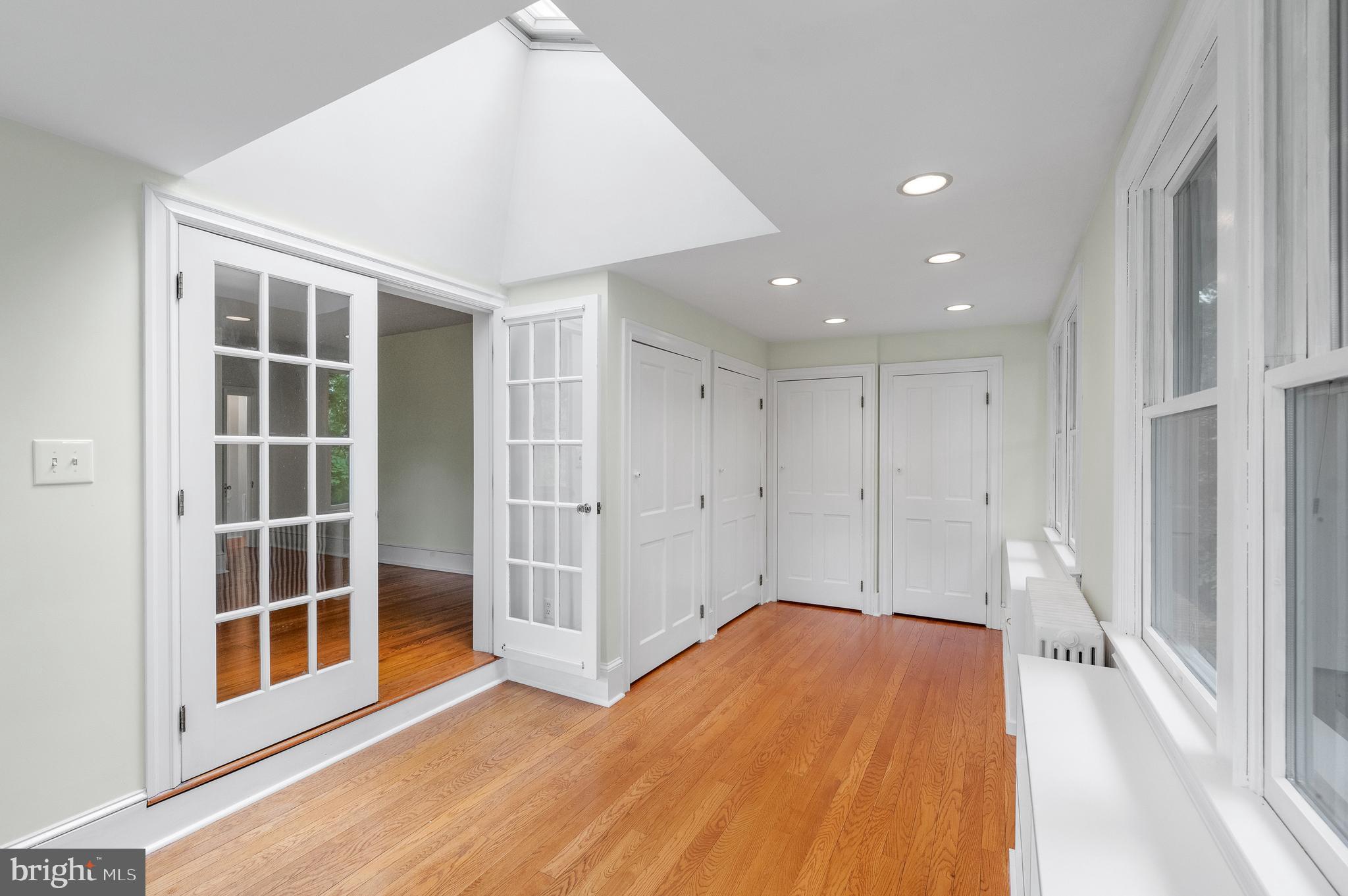 823 King Of Prussia Road Radnor, PA 19087 - Photo 41 of 71 a view of empty room with wooden floor and windows
