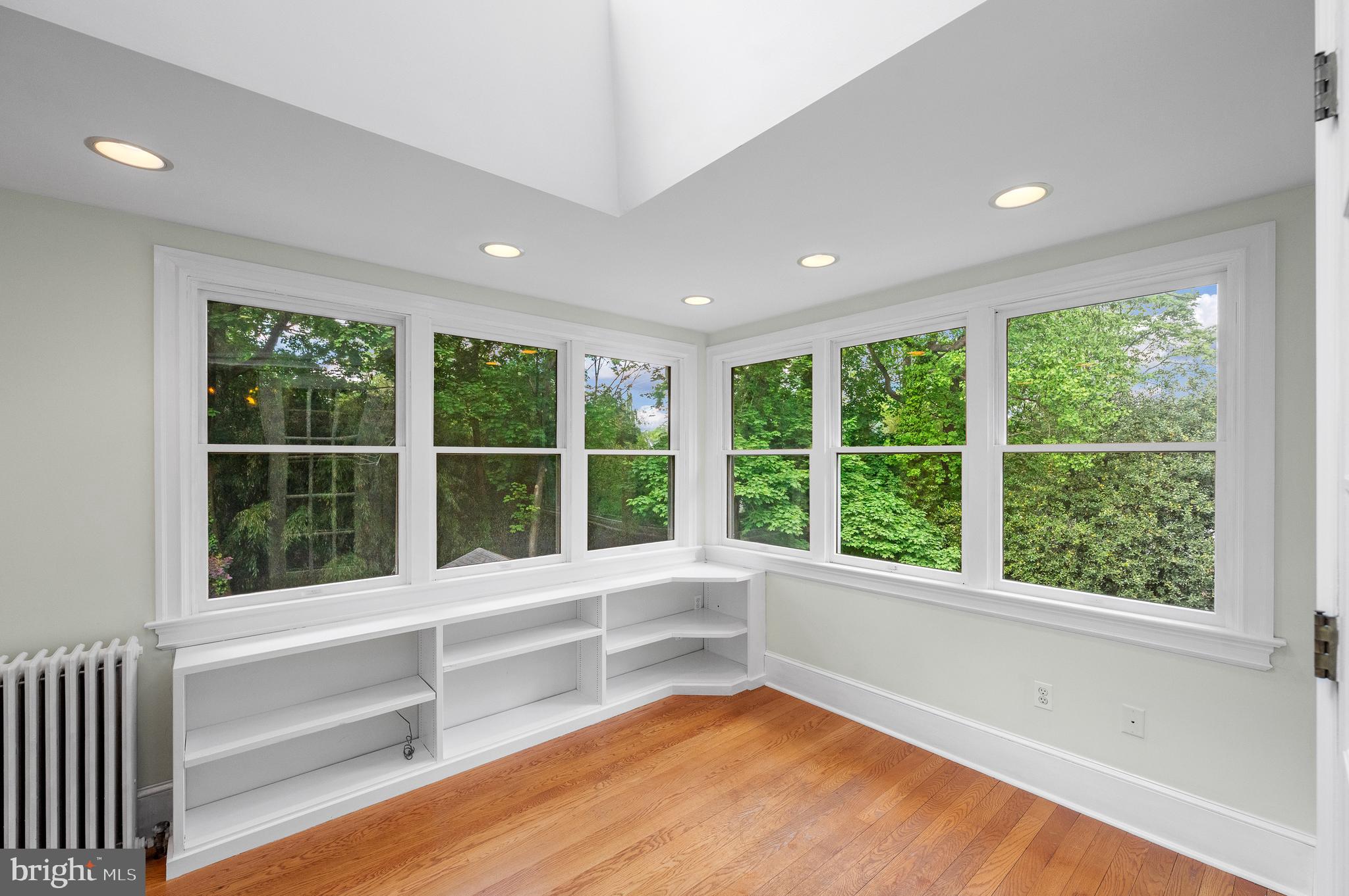 823 King Of Prussia Road Radnor, PA 19087 - Photo 42 of 71 a view of an empty room with a window and wooden floor