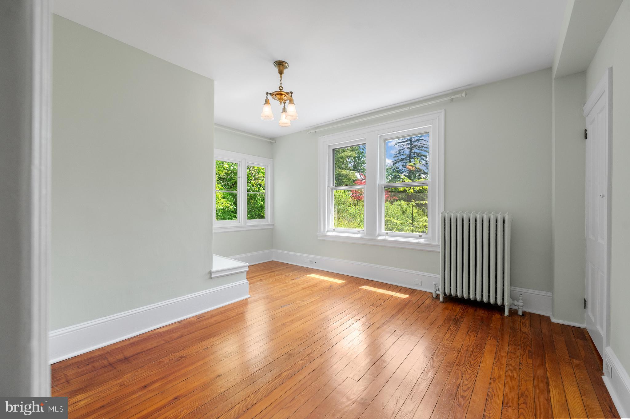 823 King Of Prussia Road Radnor, PA 19087 - Photo 44 of 71 an empty room with wooden floor and windows