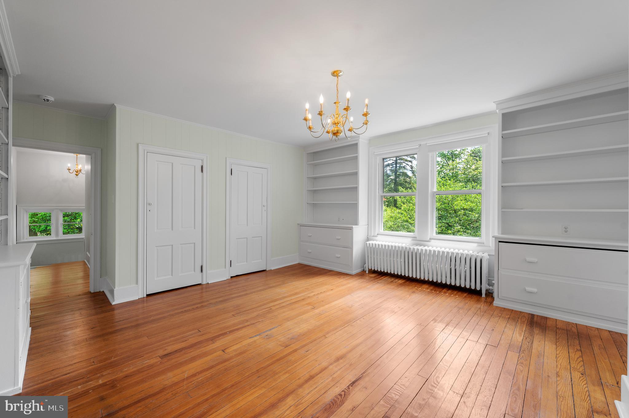 823 King Of Prussia Road Radnor, PA 19087 - Photo 48 of 71 a view of an empty room with wooden floor and a window