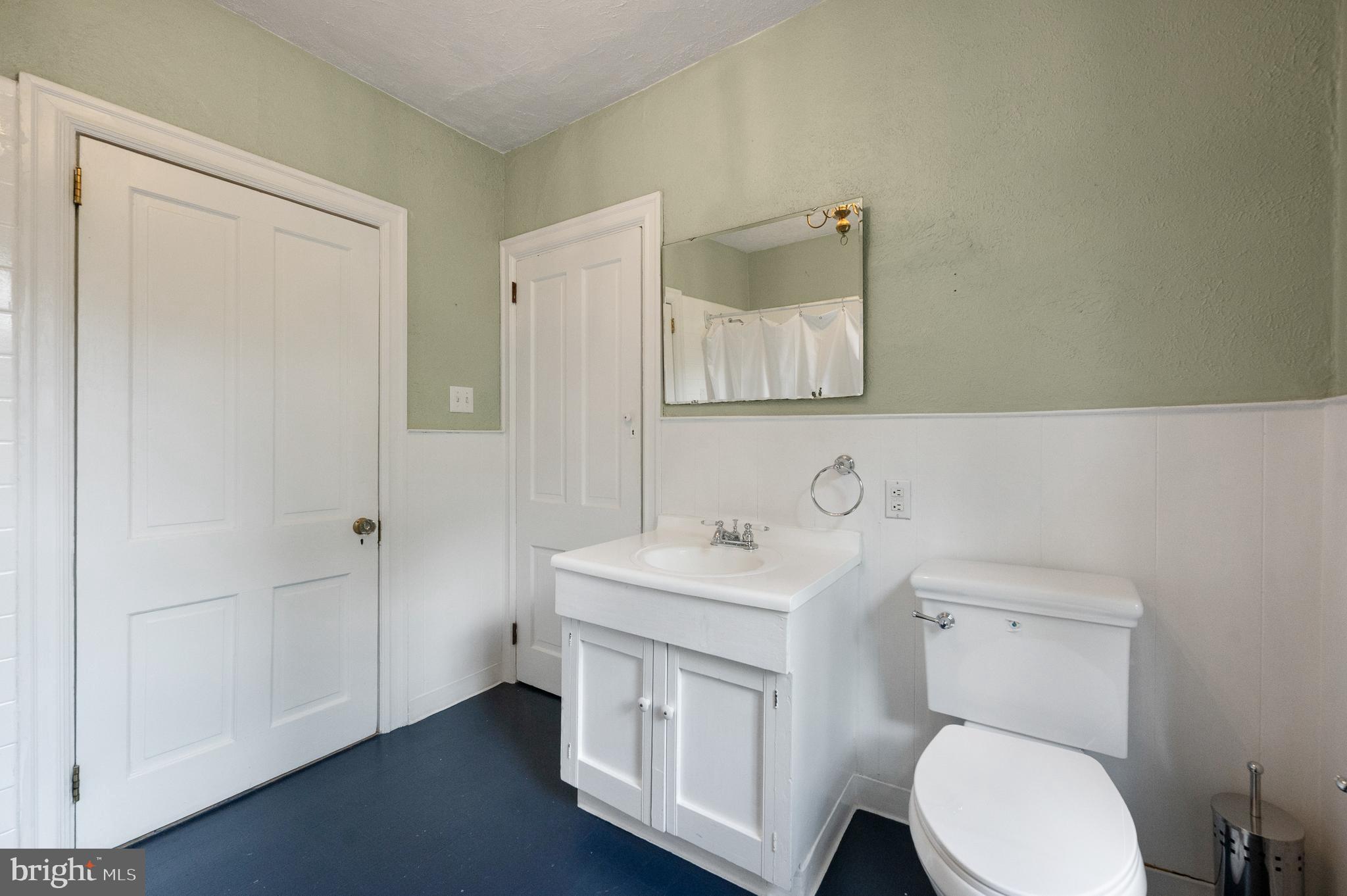 823 King Of Prussia Road Radnor, PA 19087 - Photo 50 of 71 a bathroom with a toilet a sink and mirror