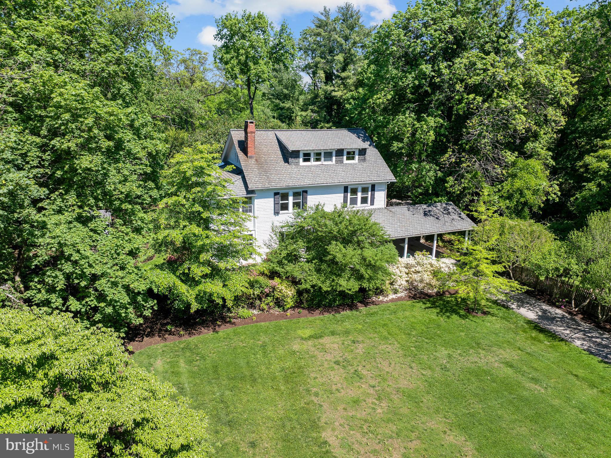 823 King Of Prussia Road Radnor, PA 19087 - Photo 5 of 71 a view of a house next to a big yard and large trees