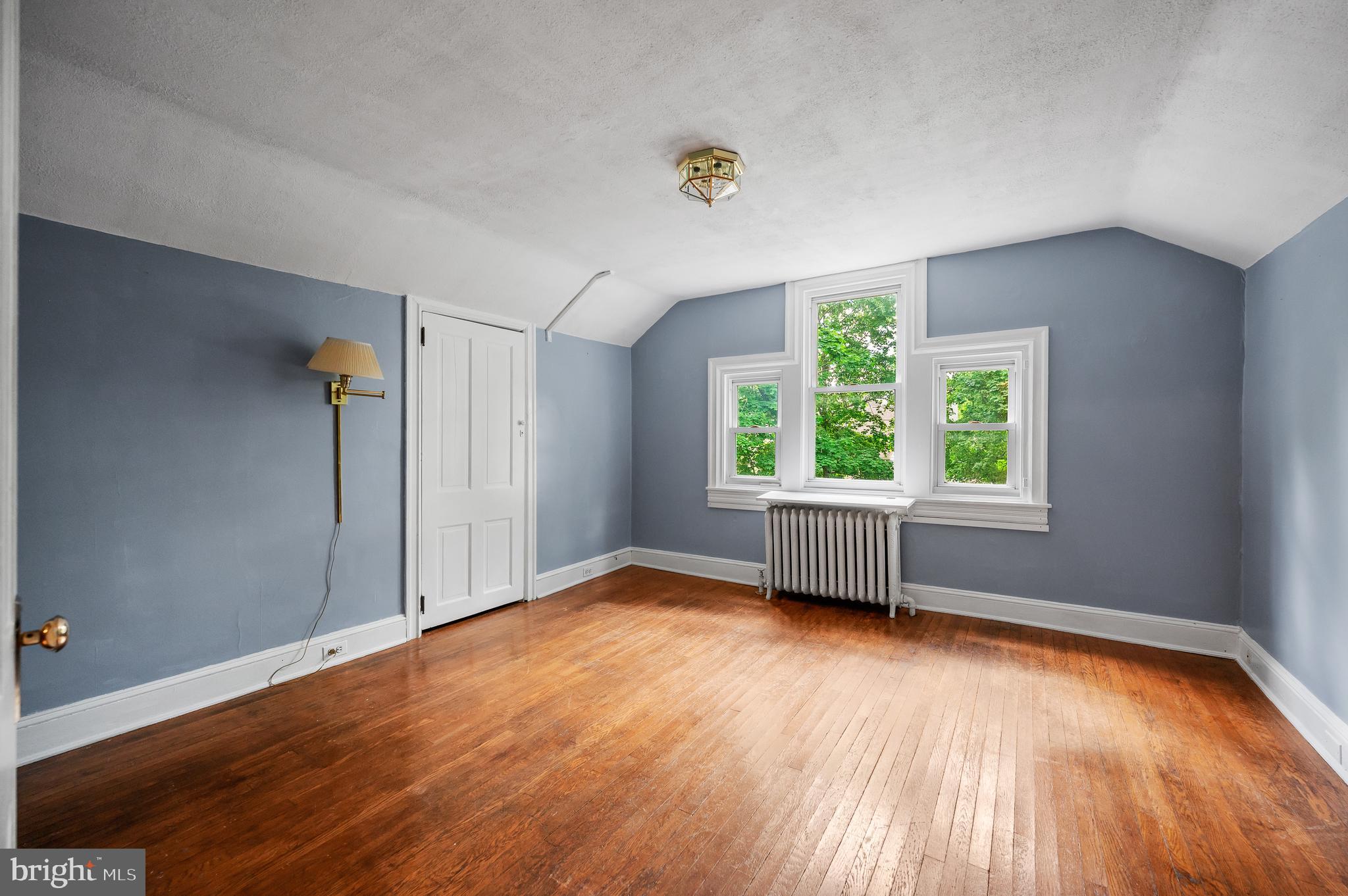 823 King Of Prussia Road Radnor, PA 19087 - Photo 54 of 71 an empty room with wooden floor and windows