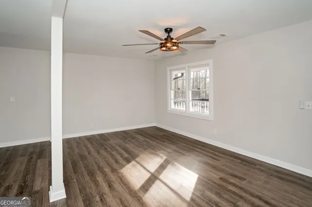 a backyard of a house with lots of green space