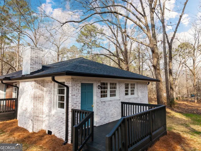 a backyard of a house with lots of green space