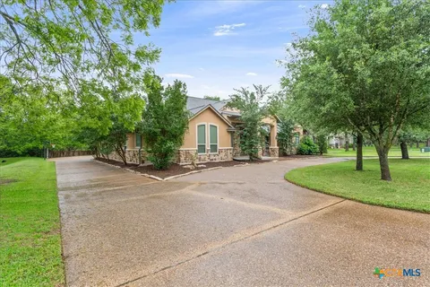 a house view with a outdoor space