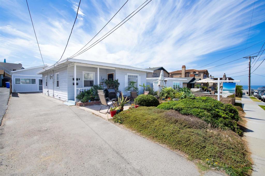 157 Maple Avenue Carlsbad, CA 92008 - Photo 1 of 16 a view of a house with a patio