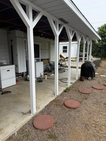 a view of a backyard of a house