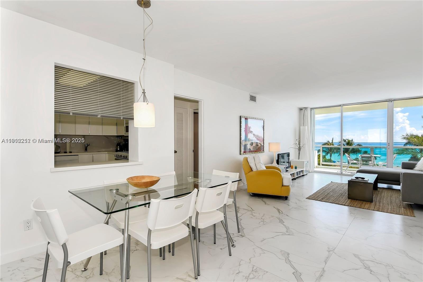 5151 Collins Avenue, Unit 619 Miami Beach, FL 33140 - Photo 3 of 16 a outdoor space with furniture and couch