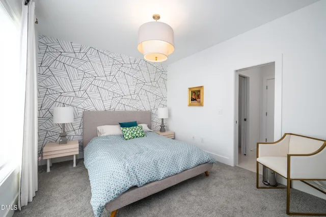 a bathroom with a sink vanity and mirror
