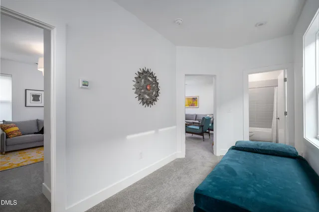 a living room with furniture and a table