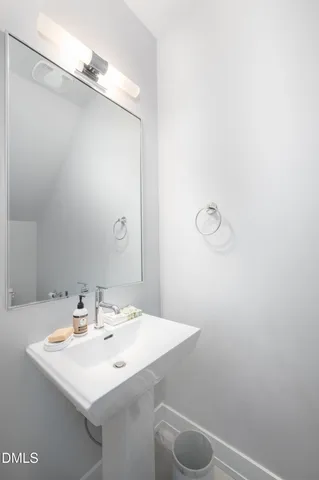 a room with a baby crib and a window