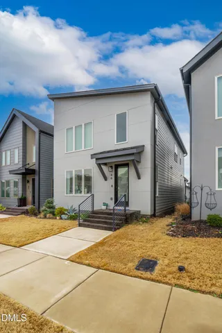 a front view of a house with yard