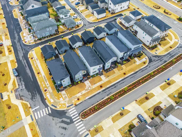 a view of a house with a yard porch and sitting area