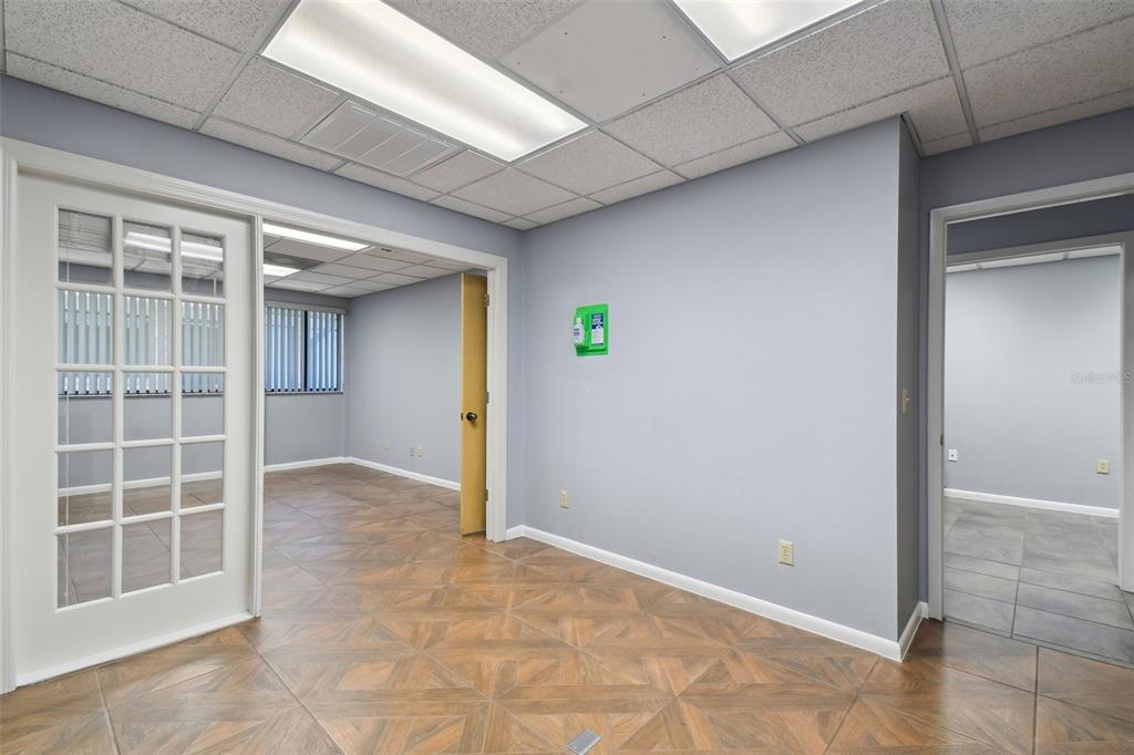 701 Enterprise Road East, Unit 100 Safety Harbor, FL 34695 - Photo 12 of 96 a view of an empty room with a window