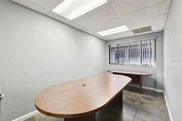 a bathroom with a sink toilet and a mirror