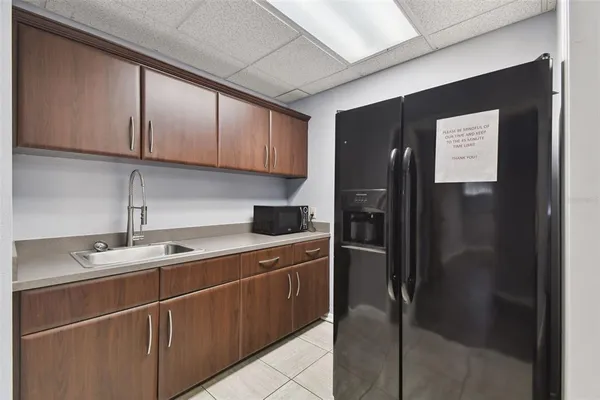 a bathroom with a sink a toilet and a shower