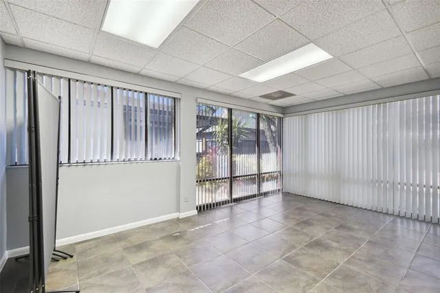 a view of a storage and utility room with a sink