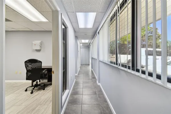a kitchen with stainless steel appliances a stove a refrigerator and a refrigerator