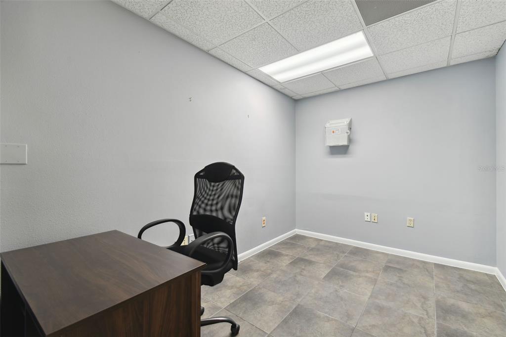 701 Enterprise Road East, Unit 100 Safety Harbor, FL 34695 - Photo 47 of 96 a view of a storage and utility room with a sink