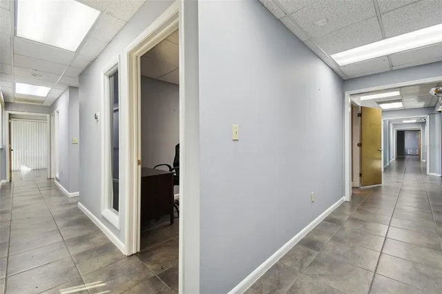 a view of yard with swimming pool and green space