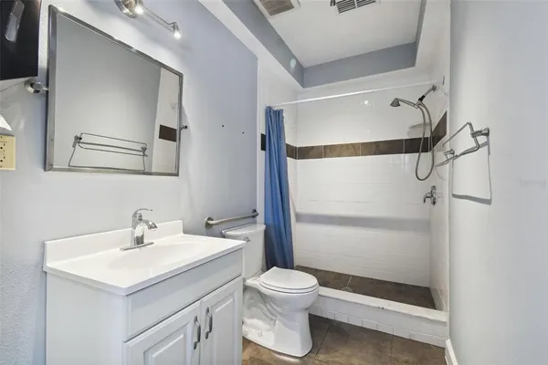 an aerial view of house with yard