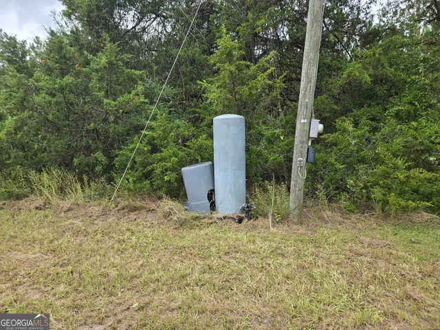a view of a room with a trees