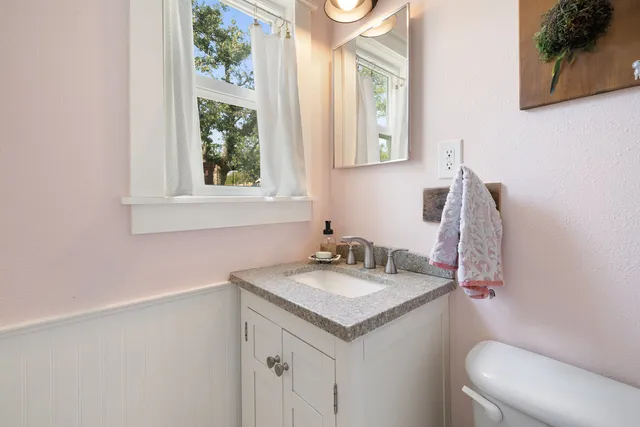 a bathroom with a sink and a toilet