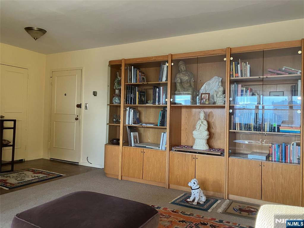 280 Prospect Avenue, Unit 11H Hackensack, NJ 07601 - Photo 3 of 20 a living room with furniture
