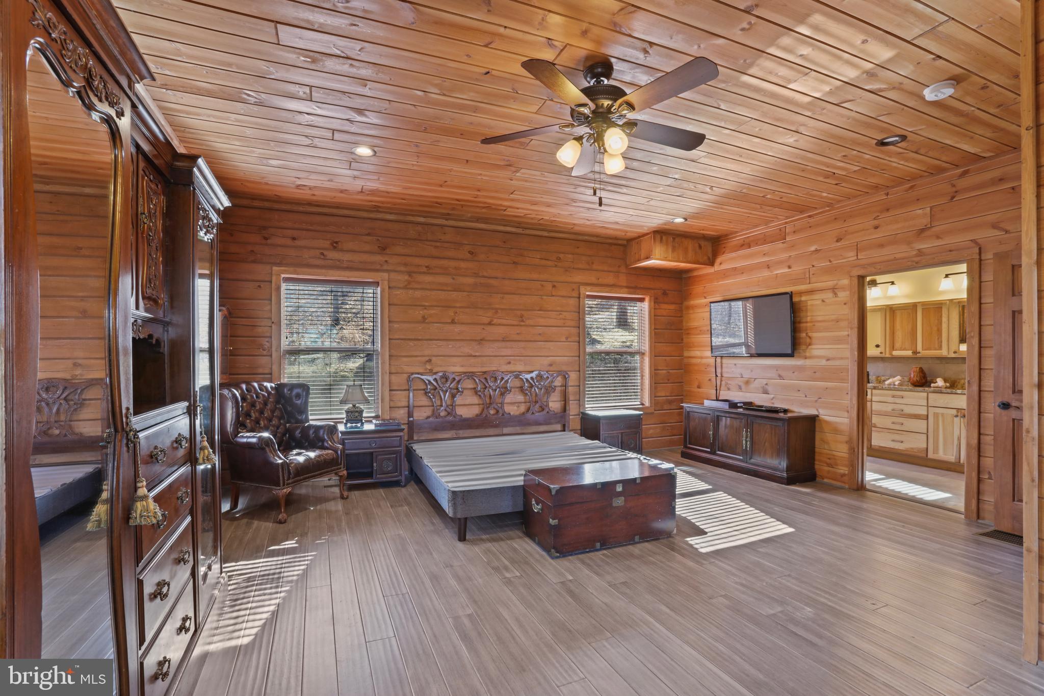 3444 Calmes Neck Lane Boyce, VA 22620 - Photo 20 of 66 a living room with furniture and wooden floor