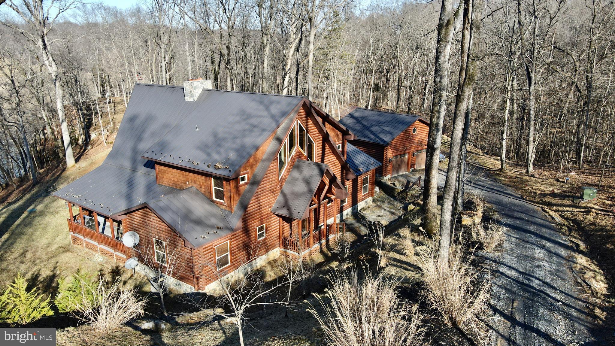 3444 Calmes Neck Lane Boyce, VA 22620 - Photo 46 of 66 a view of a house with backyard and sitting area