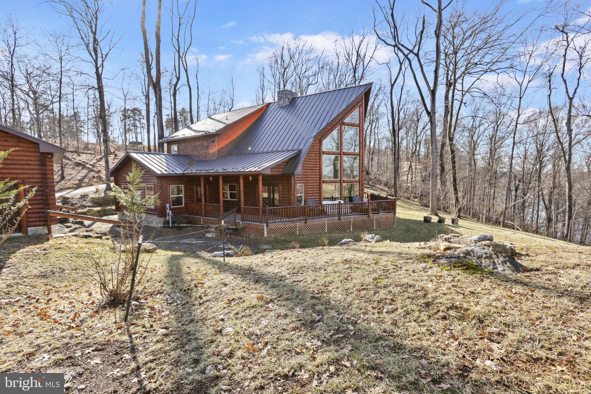 3444 Calmes Neck Lane Boyce, VA 22620 - Photo 59 of 66 a view of a house with snow on the side of the road