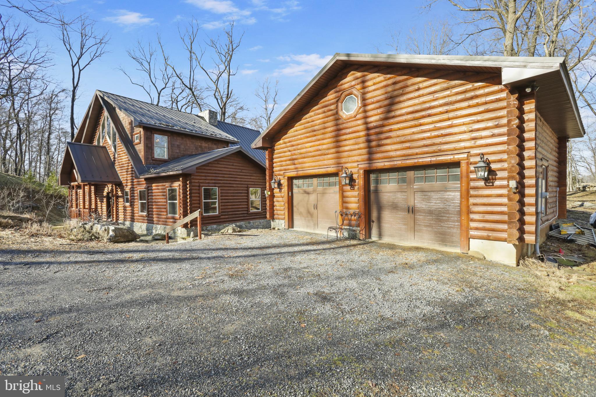 3444 Calmes Neck Lane Boyce, VA 22620 - Photo 63 of 66 a view of a house with a yard and pathway