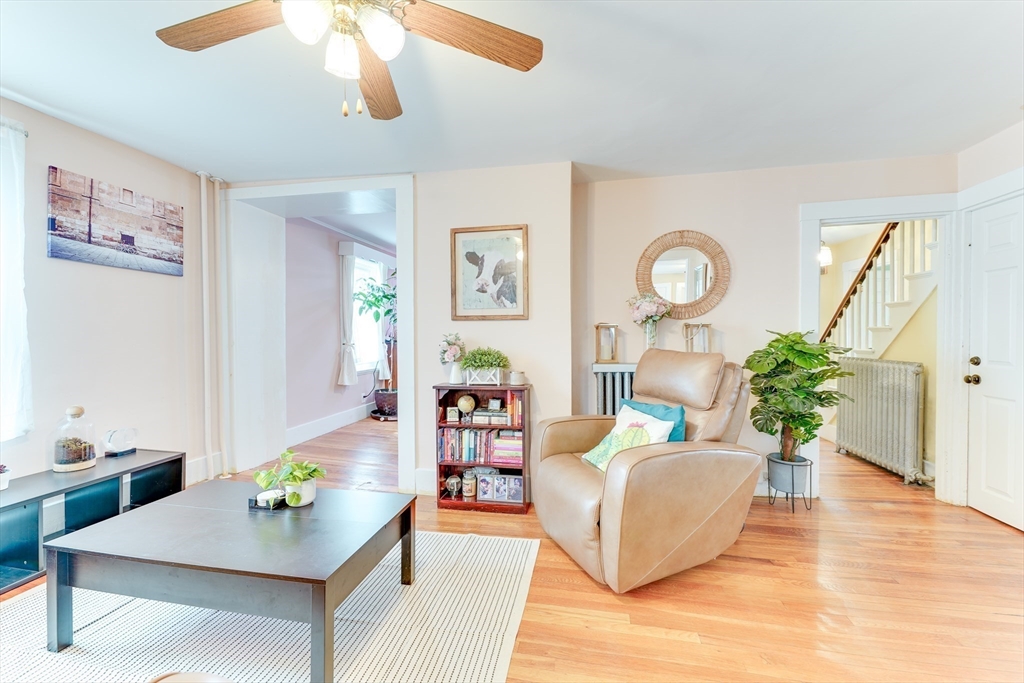 506 Washington Street Dedham, MA 02026 - Photo 11 of 28 a living room with furniture and wooden floor