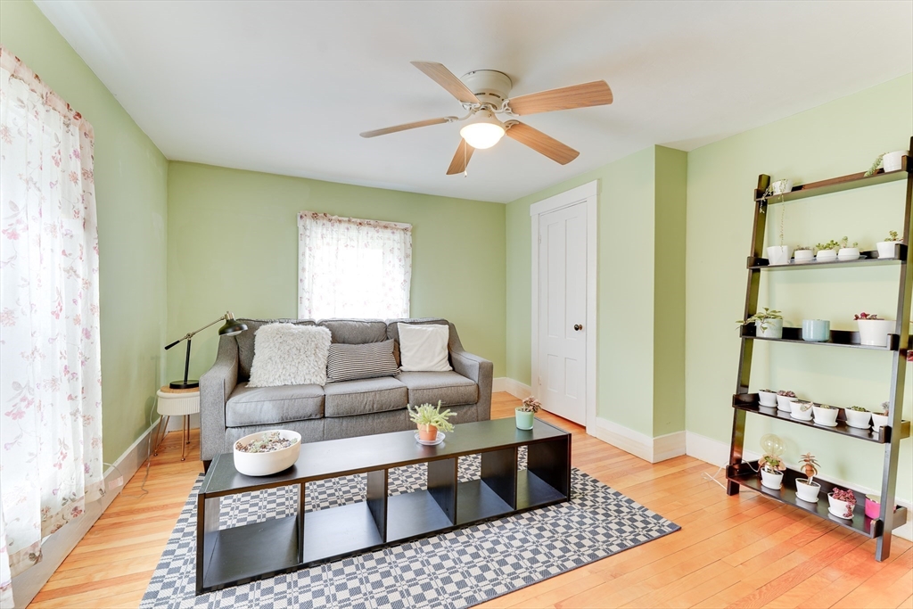 506 Washington Street Dedham, MA 02026 - Photo 20 of 28 a living room with furniture