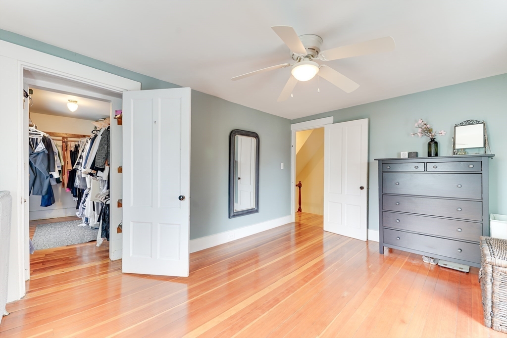 506 Washington Street Dedham, MA 02026 - Photo 21 of 28 a view of a hallway with a closet