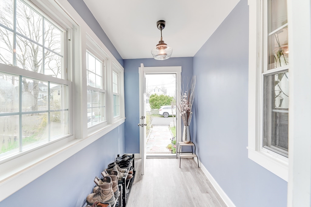506 Washington Street Dedham, MA 02026 - Photo 7 of 28 a view of hallway with windows