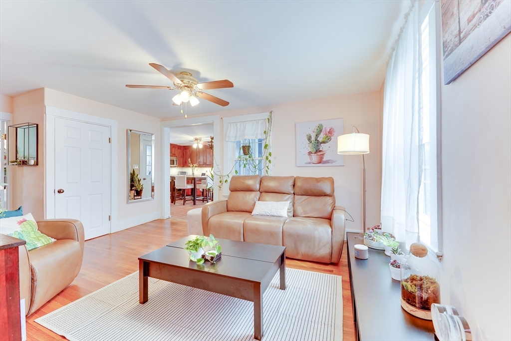506 Washington Street Dedham, MA 02026 - Photo 9 of 28 a living room with furniture and wooden floor