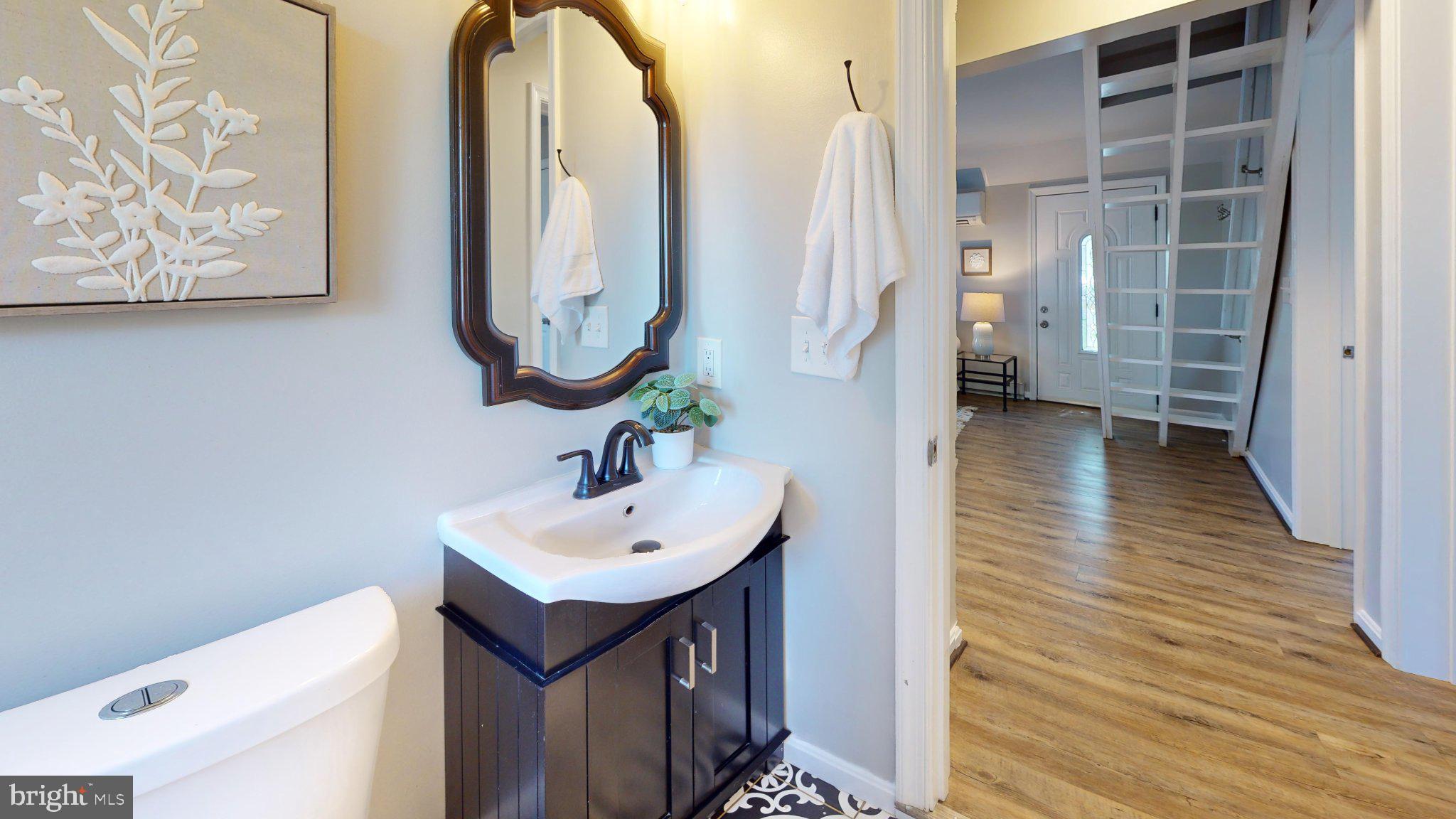 7711 Fairgreen Road Dundalk, MD 21222 - Photo 11 of 18 Chic bathroom with modern elegance.
