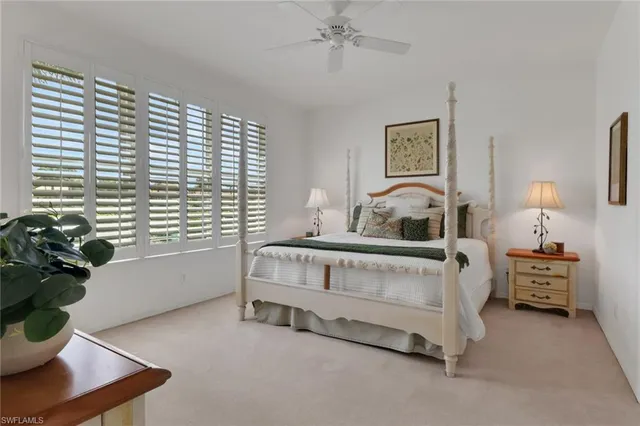 a bedroom with furniture and a window
