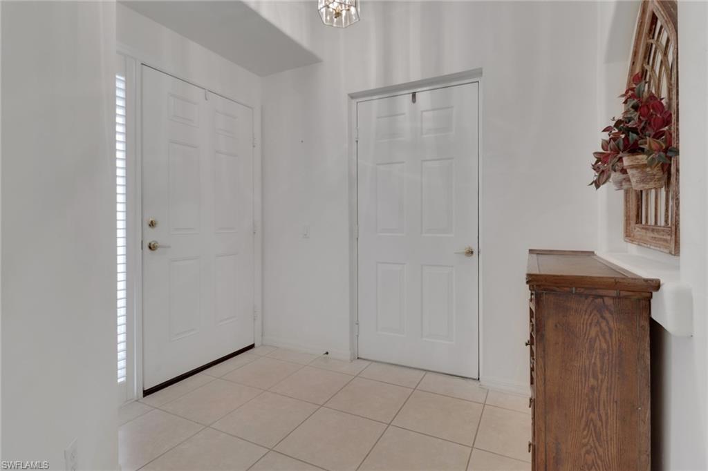 23790 Clear Spring Court, Unit 1603 Estero, FL 34135 - Photo 19 of 39 a view of an entryway with a pot