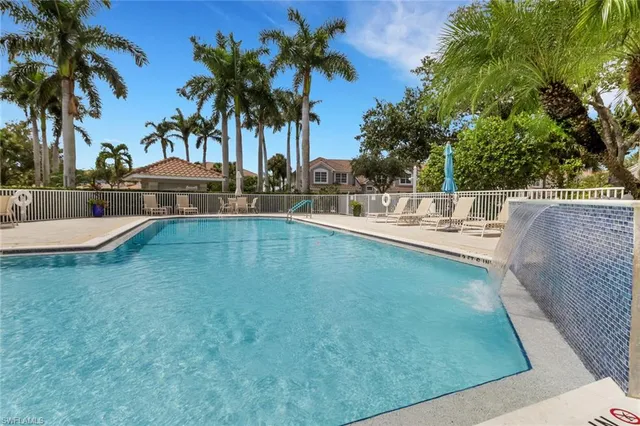 a view of a house with a swimming pool