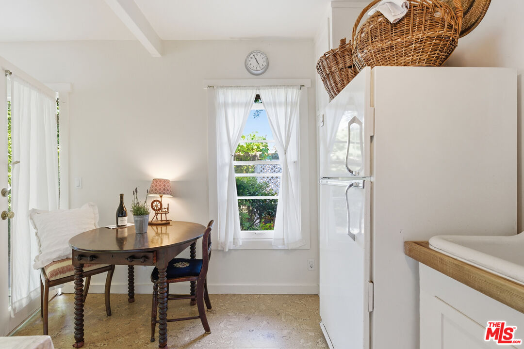1019 Pine Street Santa Monica, CA 90405 - Photo 27 of 36 a dining room with furniture and window