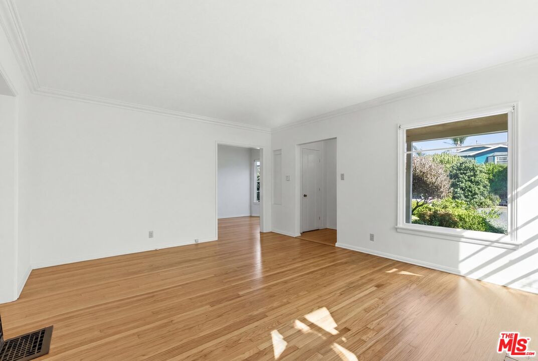 1019 Pine Street Santa Monica, CA 90405 - Photo 5 of 36 a view of an empty room with a window