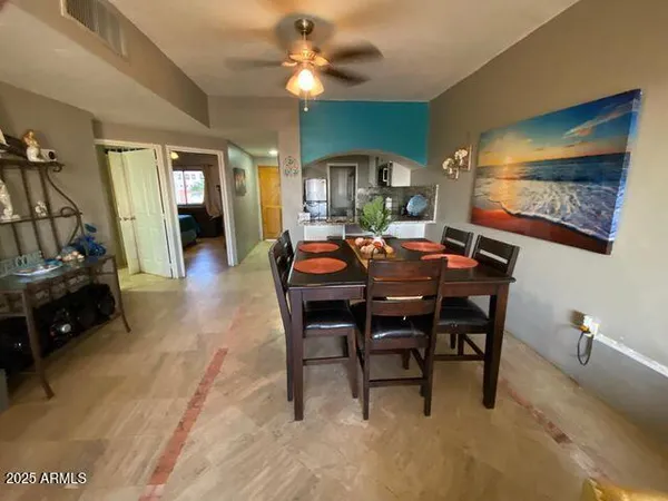 a view of a dining room with furniture