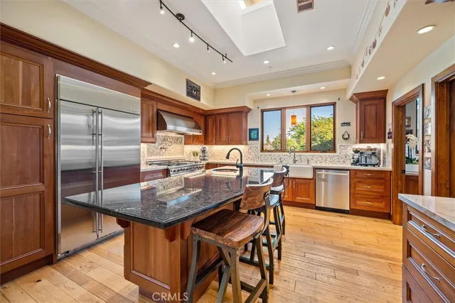 a kitchen with a stove and cabinets