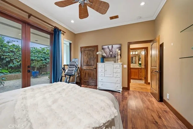 a balcony with furniture and a potted plant