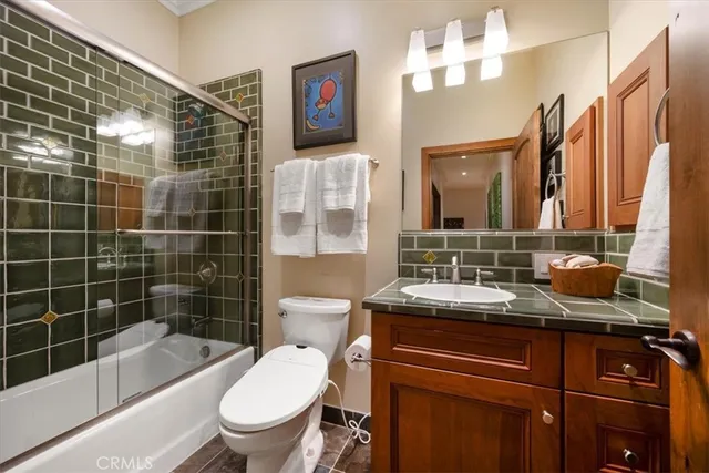 an aerial view of residential houses and outdoor space